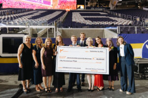 A group poses at U.S. Bank Stadium with a $50,000 check presented to Minnesota State University Moorhead for the 2026 Minnesota’s Future Award.